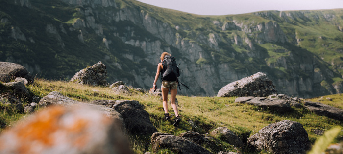 A person walking up a hillside