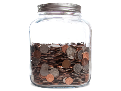 A glass jar half full of coins